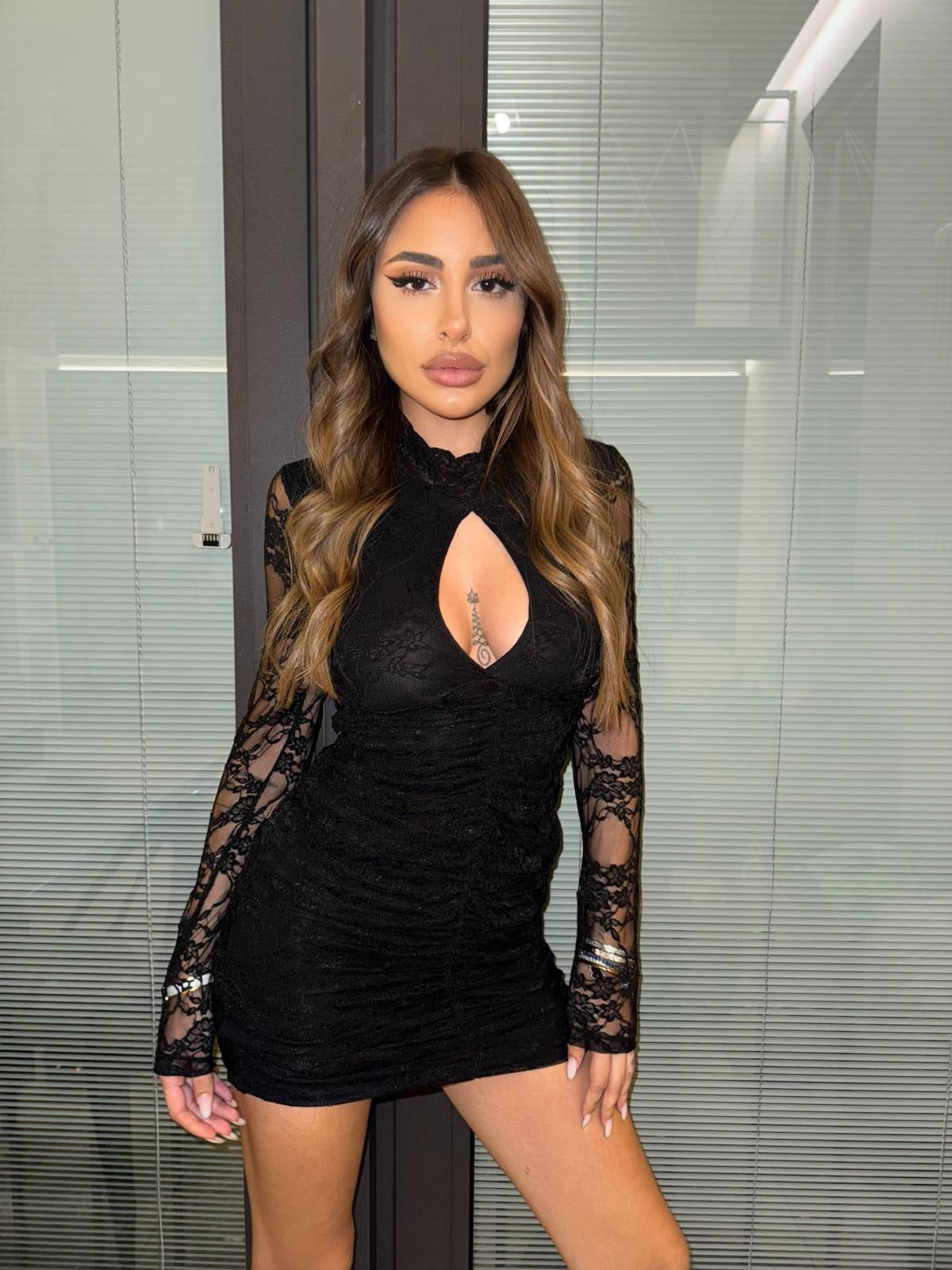Black lace dress with porthole