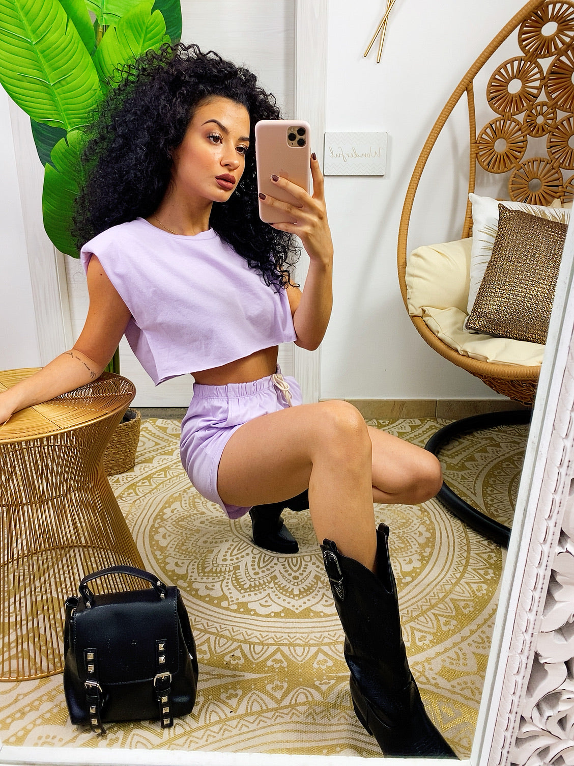 Lilac sports shirt and shorts outfit