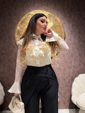 Camicetta in pizzo con voilant - R.a. Boutique