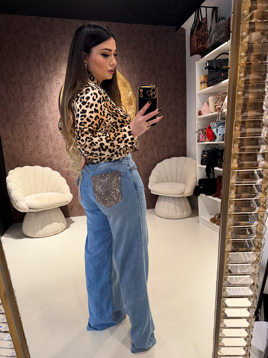 Jeans con tasca glitter maculata