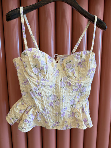 Top bustino con fiorellini giallo pastello - R.a. Boutique