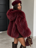 Giacca in Eco-Pelliccia con cappuccio over - R.a. Boutique