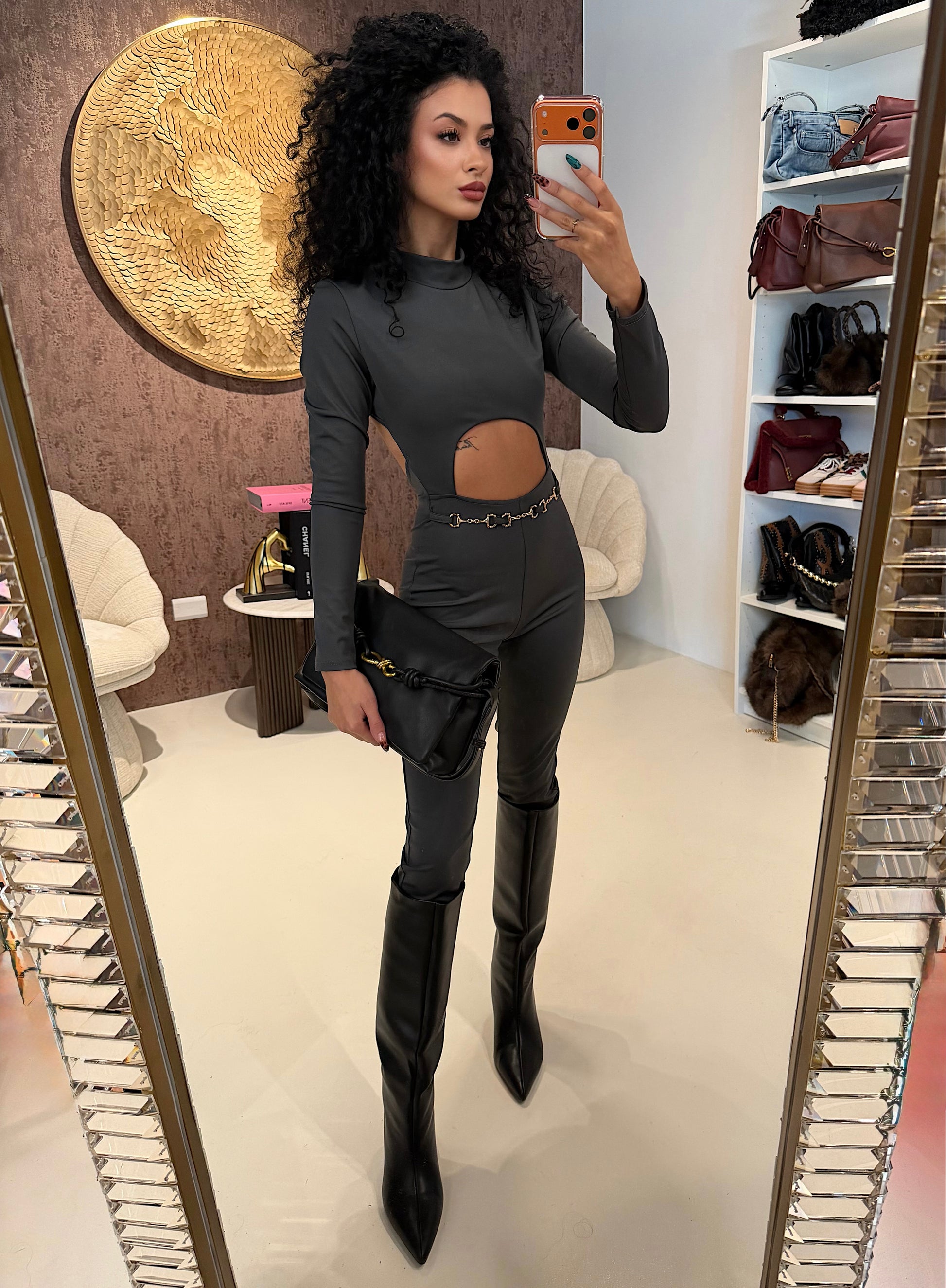 Tuta in lycra grigia schiena aperta e catenina - R.a. Boutique