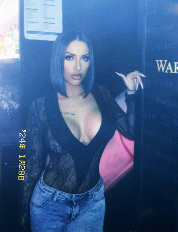 Body nero a V con trasparenza e pizzo - R.a. Boutique 