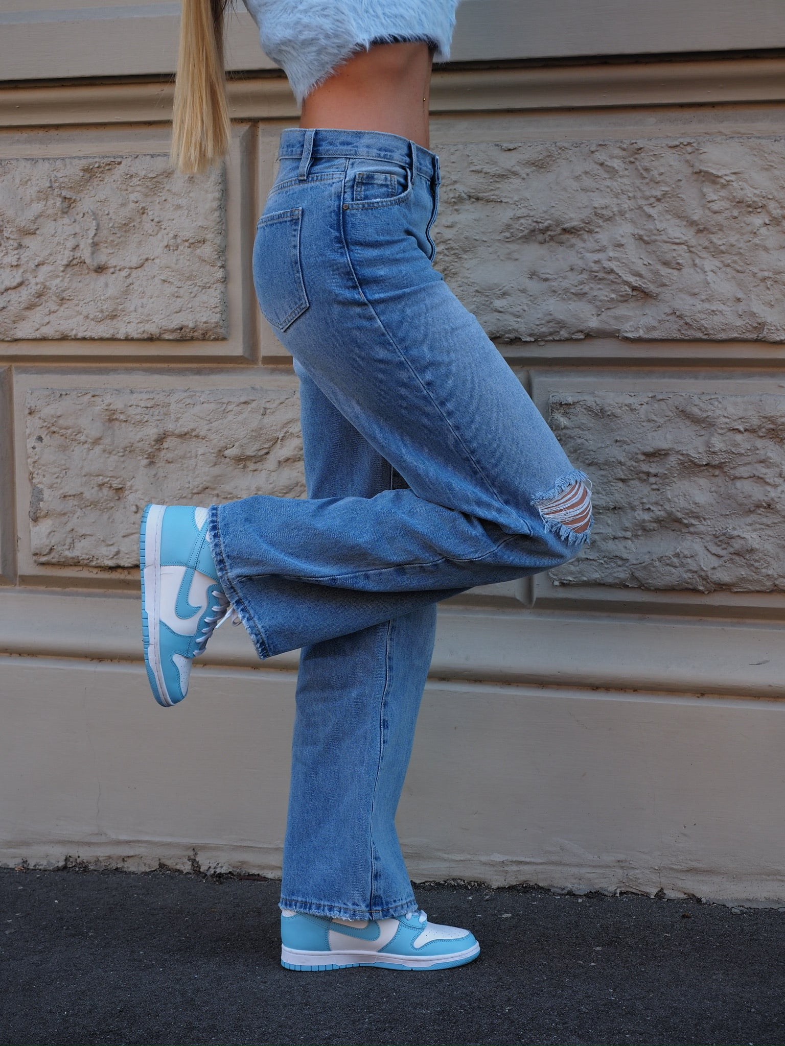 Jeans vita bassa con strappi laterali - R.a. Boutique 