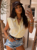 Camicia smanicata con fiocchetti - R.a. Boutique