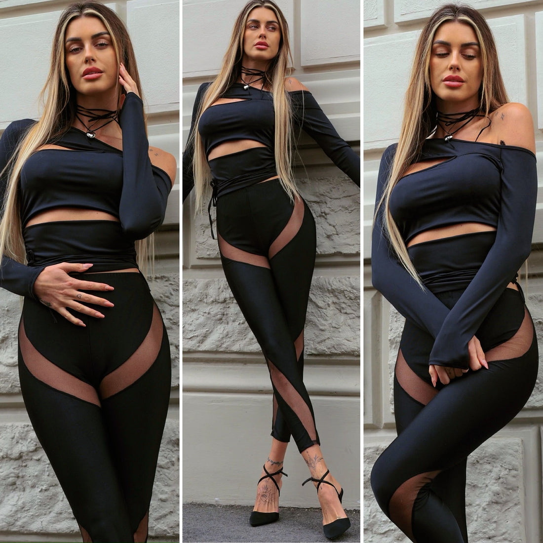 Maglia nera con spacchi - R.a. Boutique 