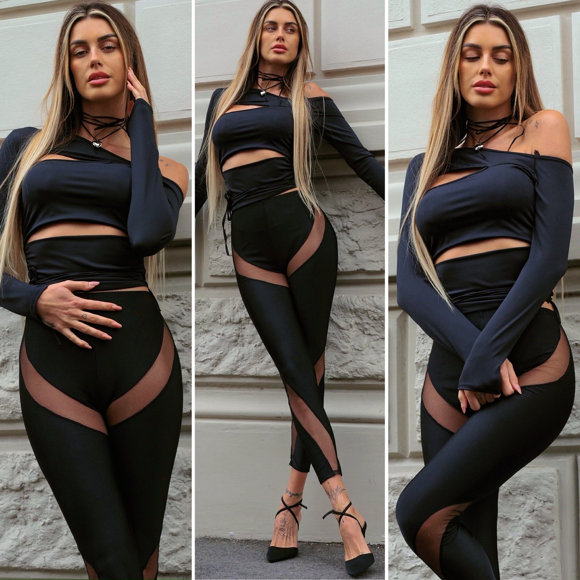 Maglia nera con spacchi - R.a. Boutique 