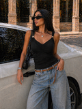 Top drap con gioiello - R.a. Boutique