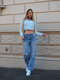 Jeans vita bassa con strappi laterali - R.a. Boutique 