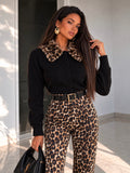 Pantalone a zampa animalier - R.a. Boutique