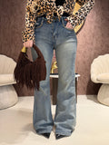 Jeans con borchie e dettaglio maculato sul retro - R.a. Boutique