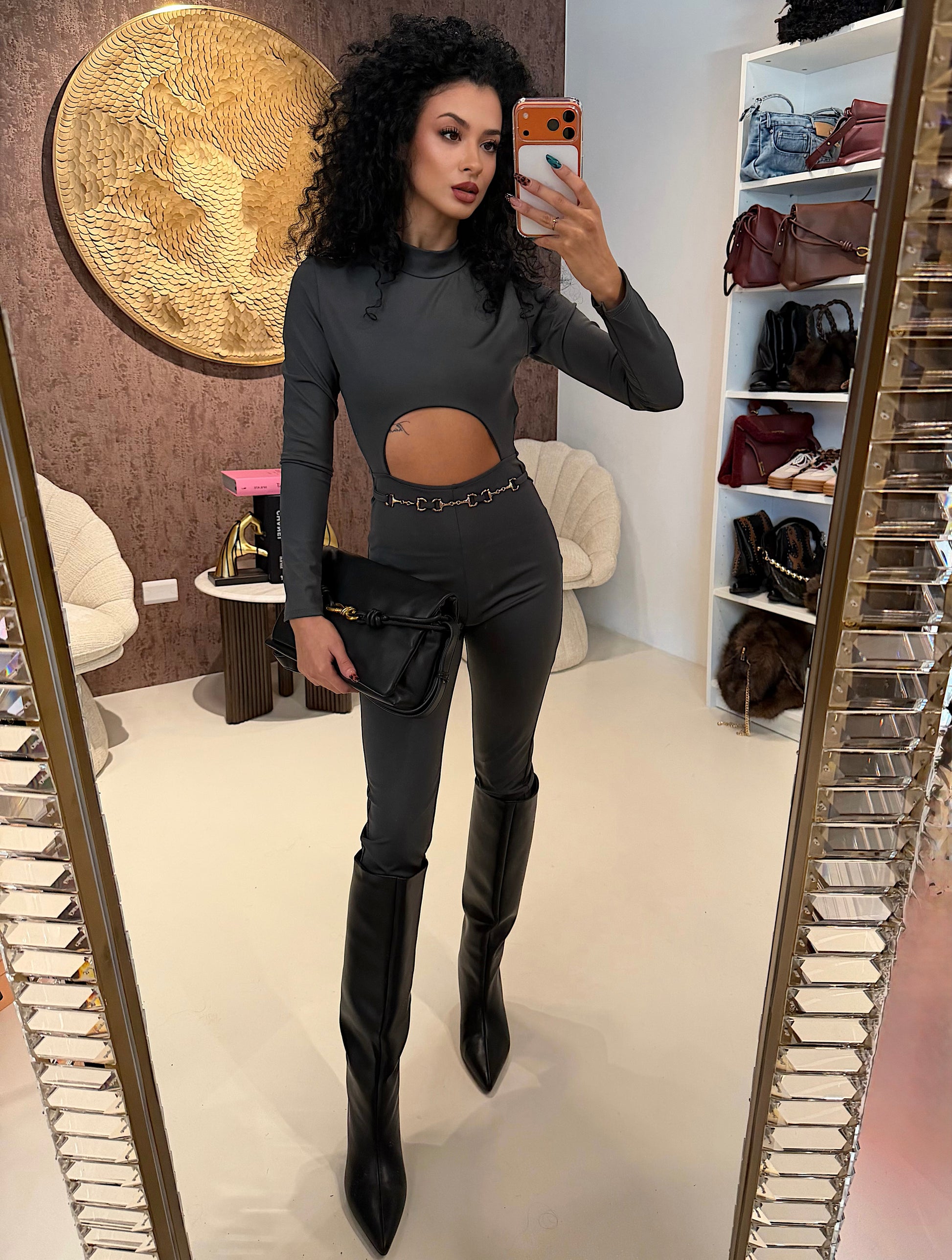 Tuta in lycra grigia schiena aperta e catenina - R.a. Boutique