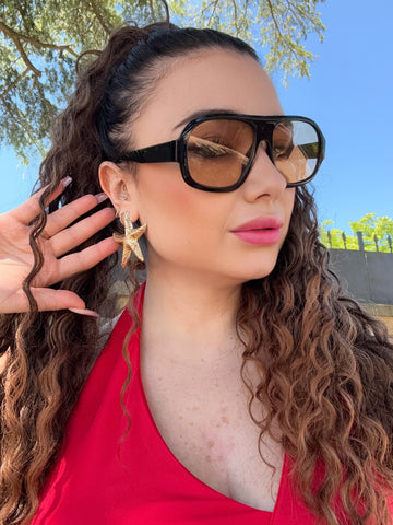 Orecchini con stella marina bombata oro - R.a. Boutique