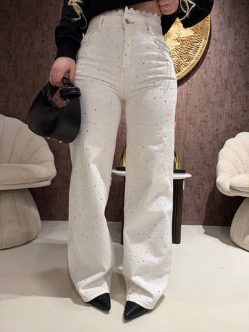 Jeans con brillantini e pizzo bianco