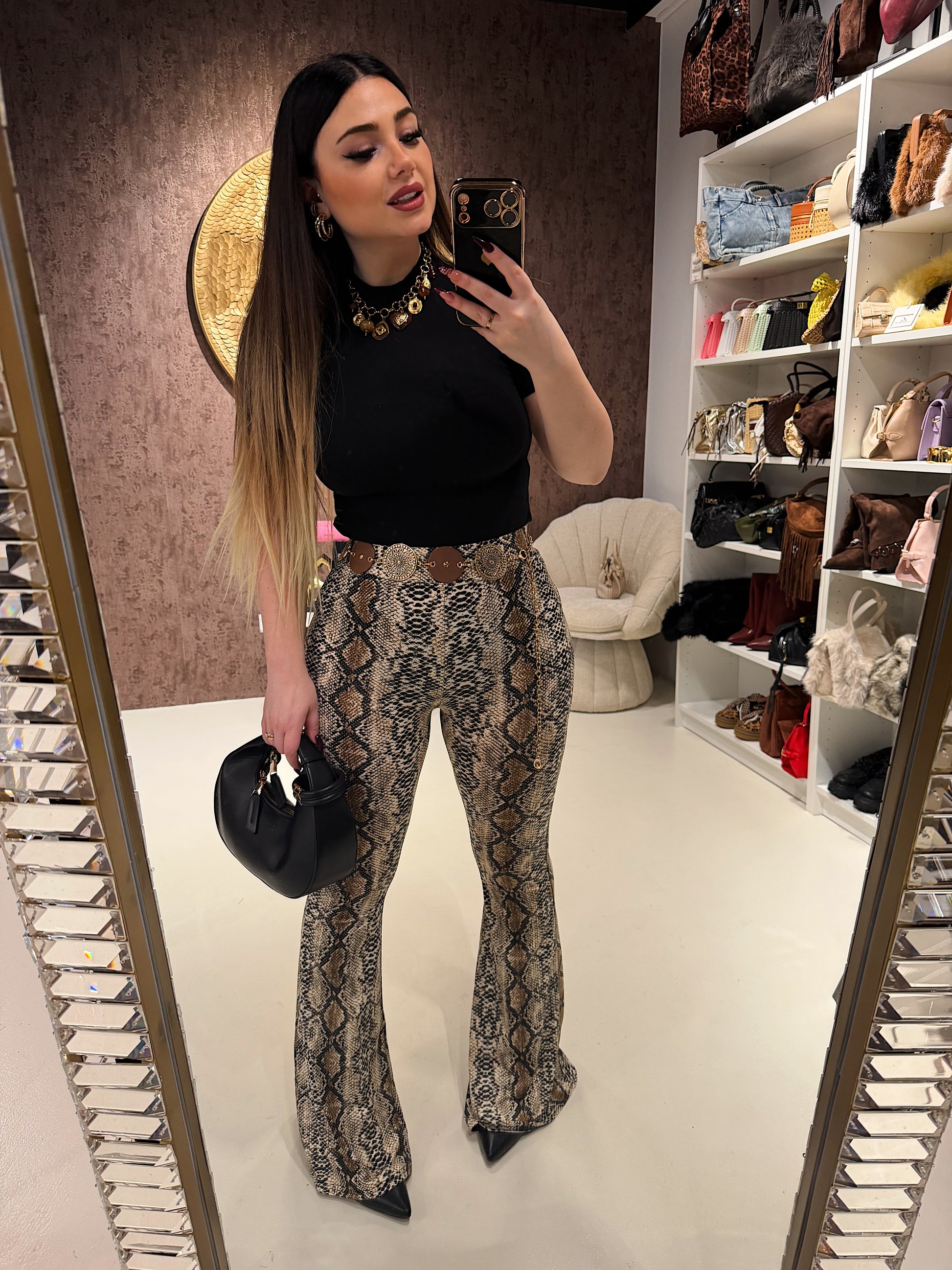 Pantalone a zampa animalier - R.a. Boutique