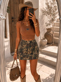 Top a costine con dettaglio brillantini - R.a. Boutique