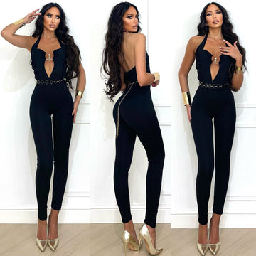 Tuta nera con arricciatura sui fianchi e gioiello - R.a. Boutique