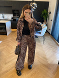 Set due pezzi pantalone e felpa animalier con banda nera - R.a. Boutique 