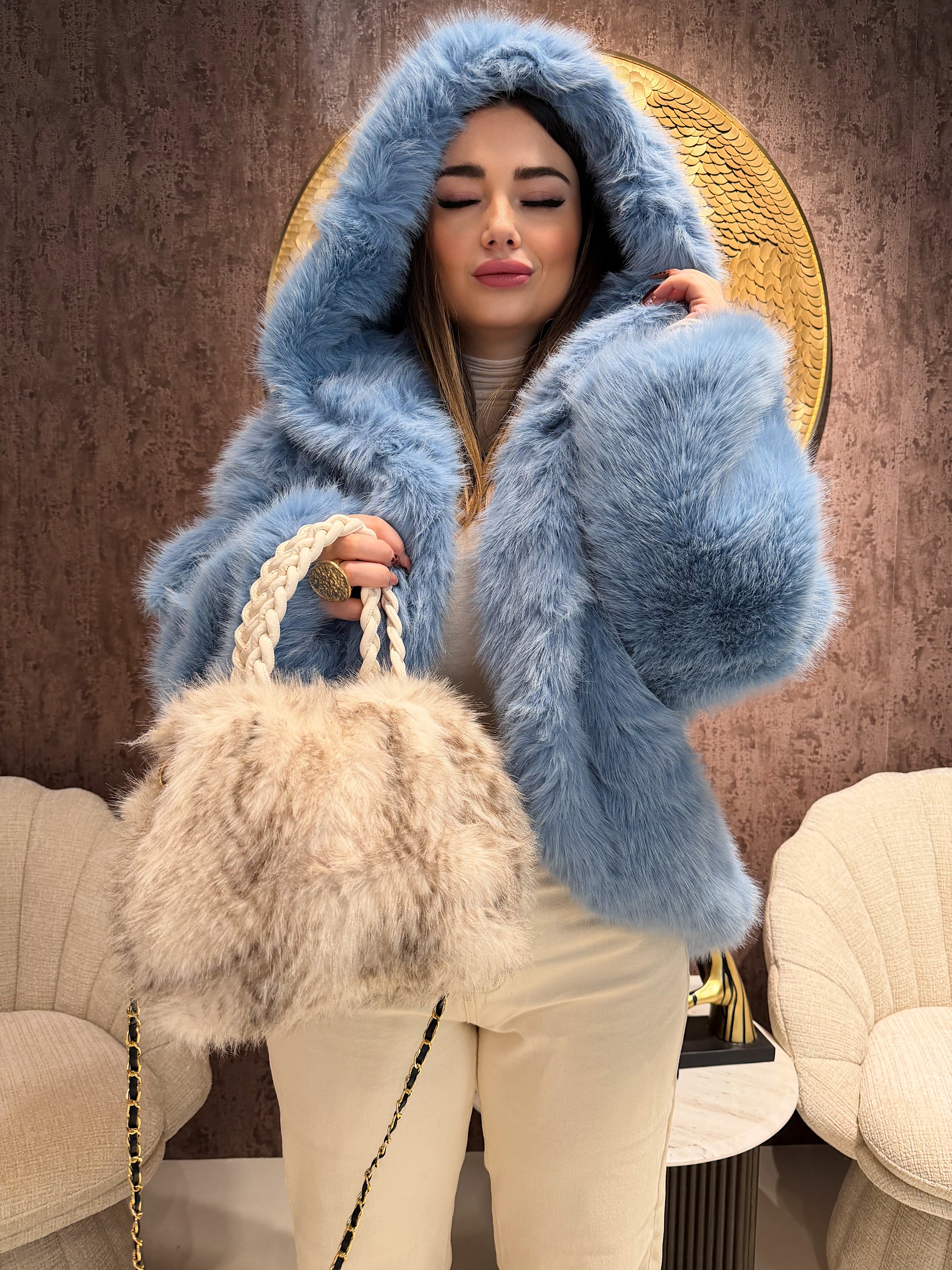 Giacca in Eco-Pelliccia con cappuccio - R.a. Boutique