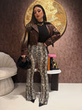 Pantalone a zampa animalier - R.a. Boutique