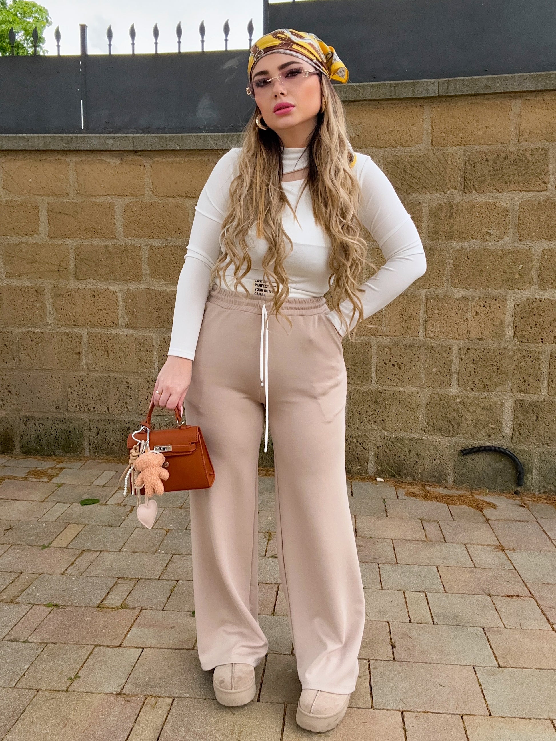 Maglia con spacco e gioiello oro - R.a. Boutique