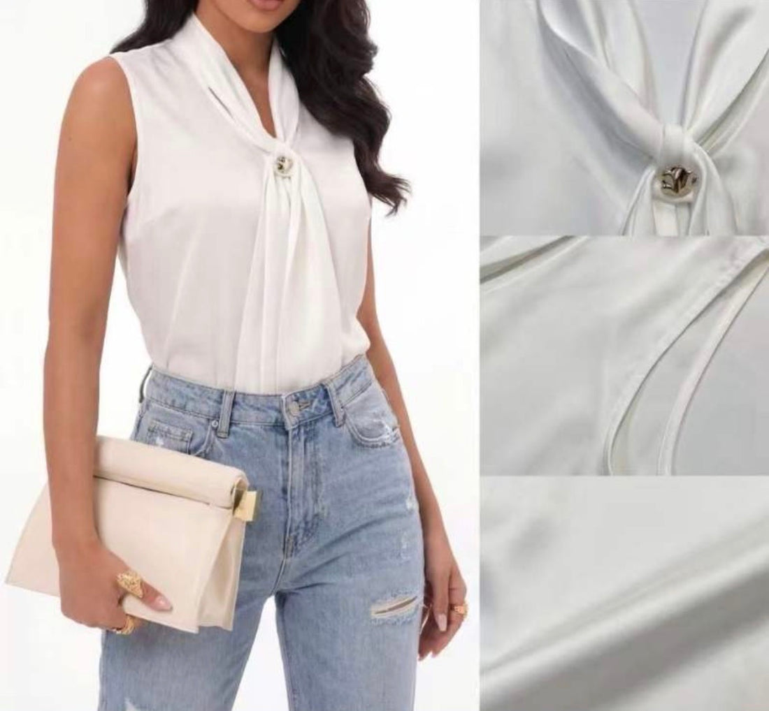 Blusa con gioiello - R.a. Boutique