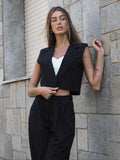 Completo smanicato e pantalone gessato nero - R.a. Boutique 
