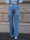 Jeans vita bassa con strappi laterali - R.a. Boutique 