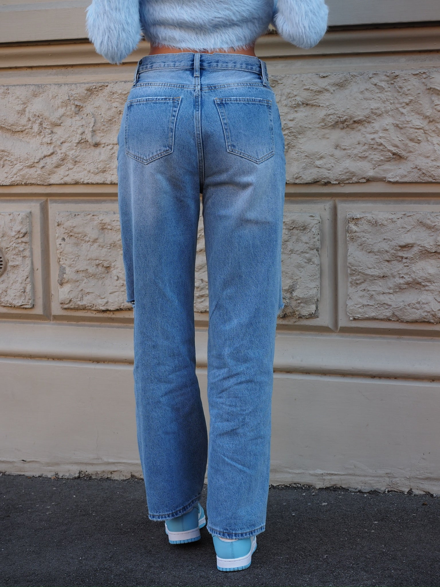 Jeans vita bassa con strappi laterali - R.a. Boutique 