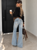 Jeans con borchie e dettaglio maculato sul retro - R.a. Boutique