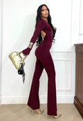 Tuta a zampa con gioiello bordeaux e schiena aperta - R.a. Boutique