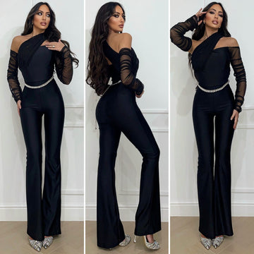 Tuta nera con maniche in velo - R.a. Boutique 