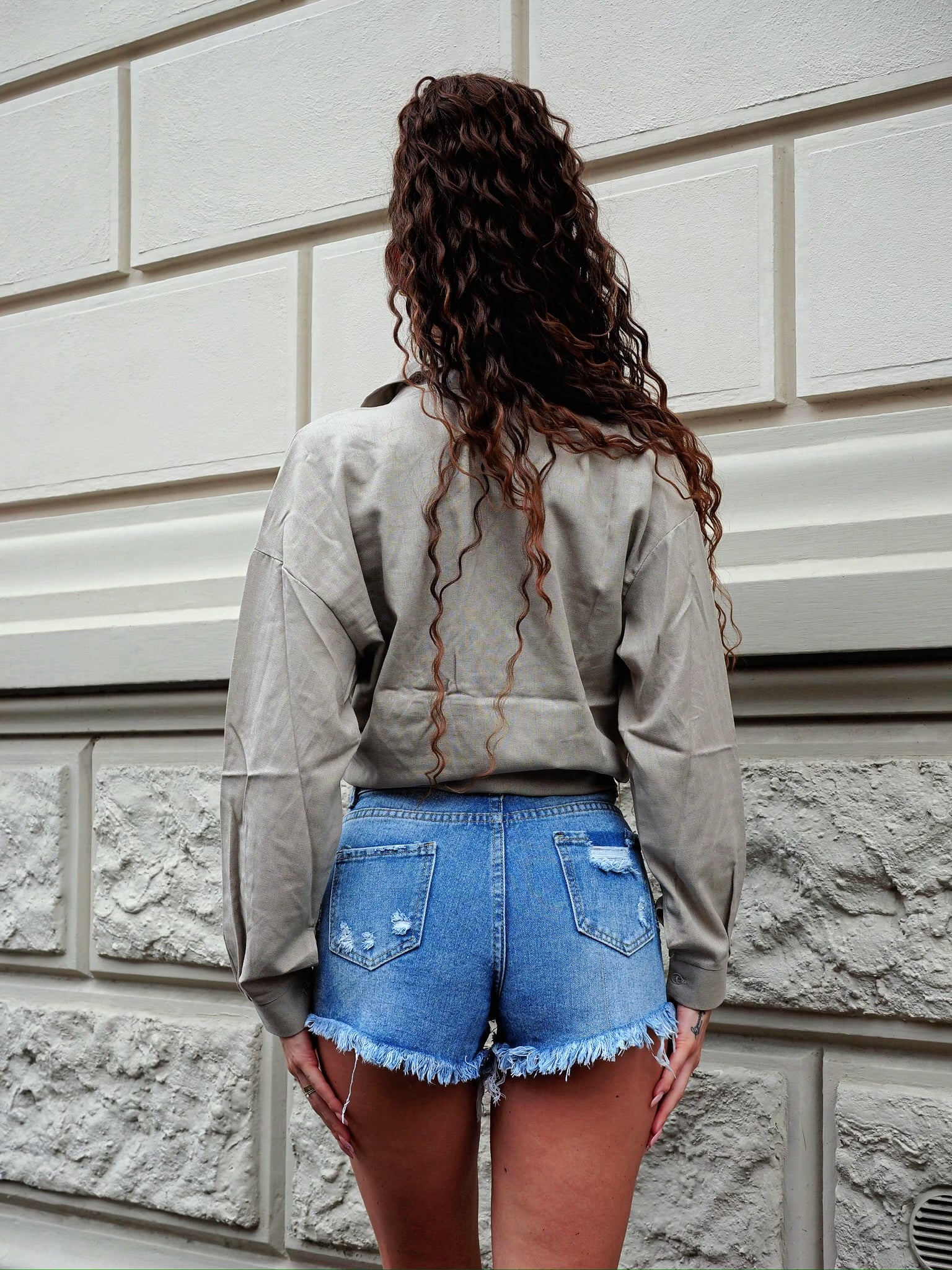 Short denim chiaro con strappini - R.a. Boutique 