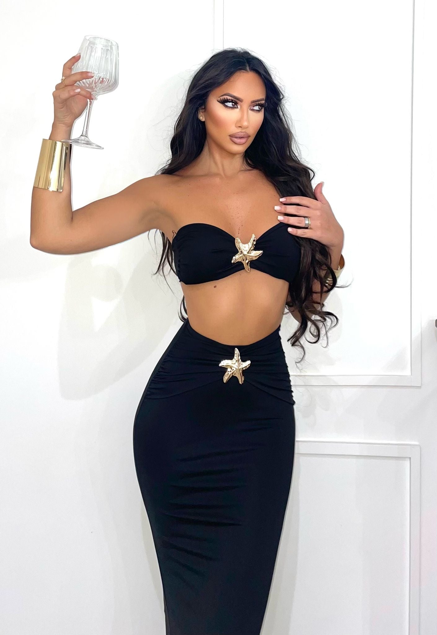 Completo top e gonna con stella nero - R.a. Boutique