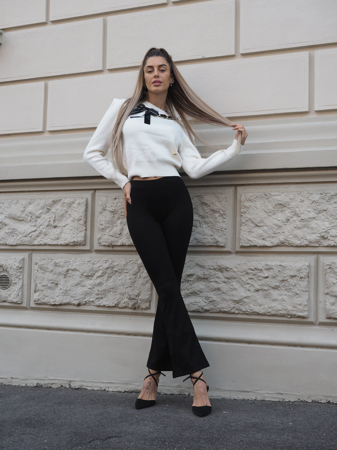 Pantalone a zampa nero - R.a. Boutique 