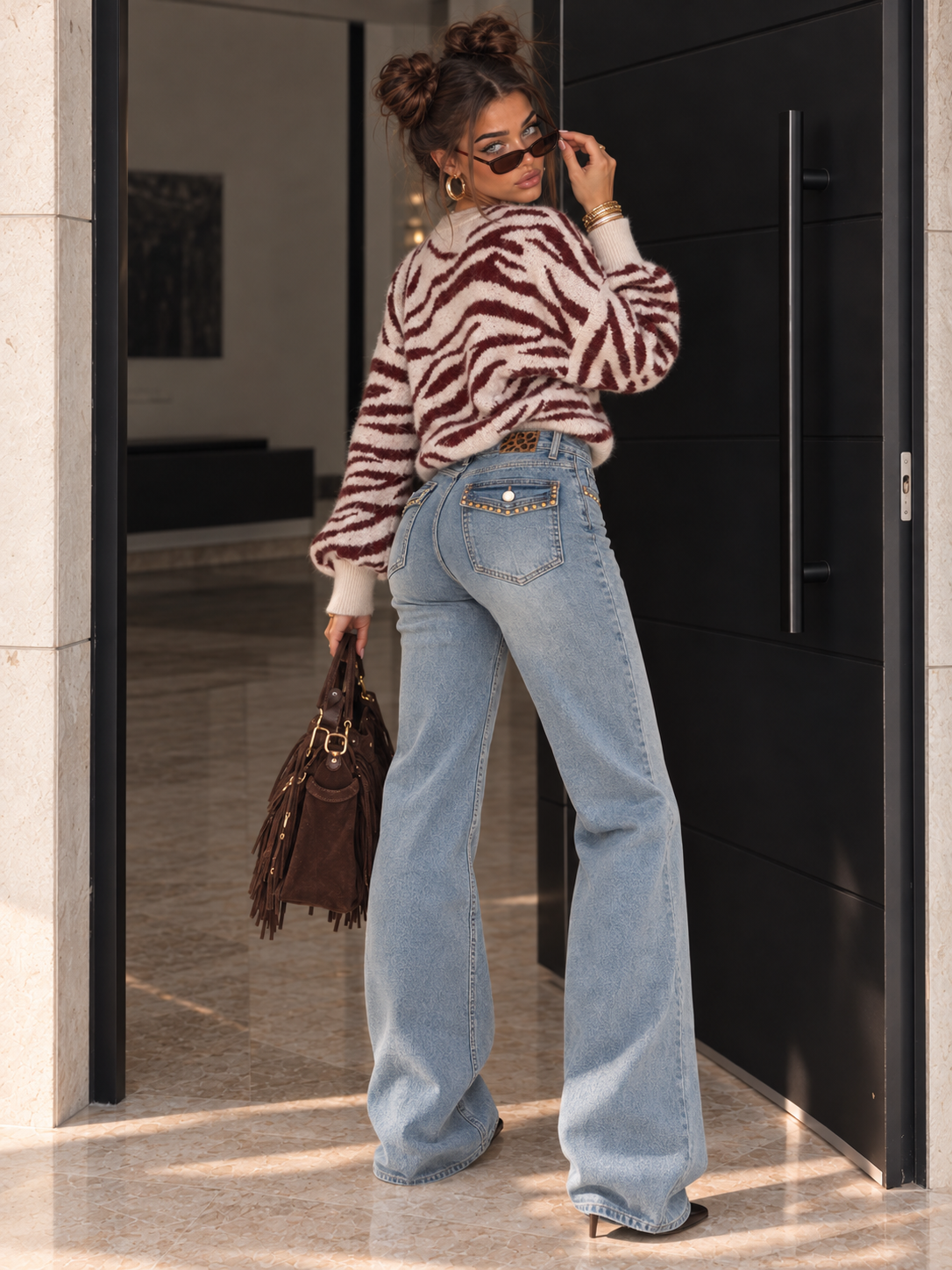 Jeans con borchie e dettaglio maculato sul retro - R.a. Boutique
