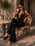 Tuta nera con gioiello oro - R.a. Boutique