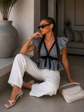 Top vichy con volant e fiocco bianco e blu - R.a. Boutique