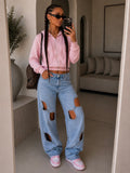 Jeans con aperture e fiocco in strass - R.a. Boutique