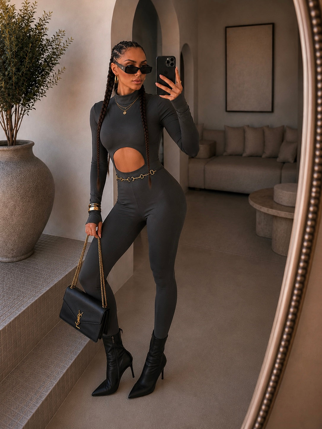 Tuta in lycra grigia schiena aperta e catenina - R.a. Boutique