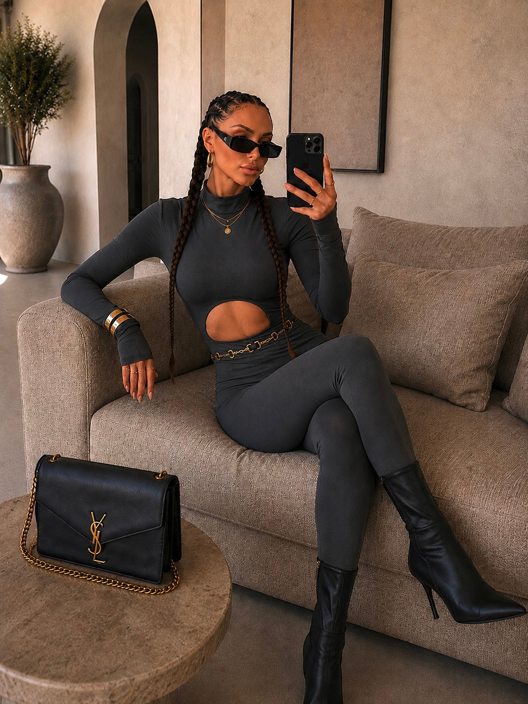 Tuta in lycra grigia schiena aperta e catenina - R.a. Boutique