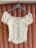 Top panna con pizzo - R.a. Boutique