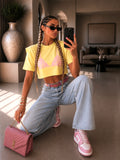 T-shirt cropped gialla con spalline imbottite - R.a. Boutique