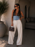 Top denim con scollo halter effetto pelle - R.a. Boutique