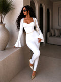Tuta bianca con rouches - R.a. Boutique