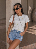 T-shirt con margherite ricamate - R.a. Boutique
