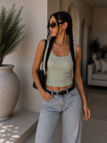 Top a costine con fiocchetti - R.a. Boutique