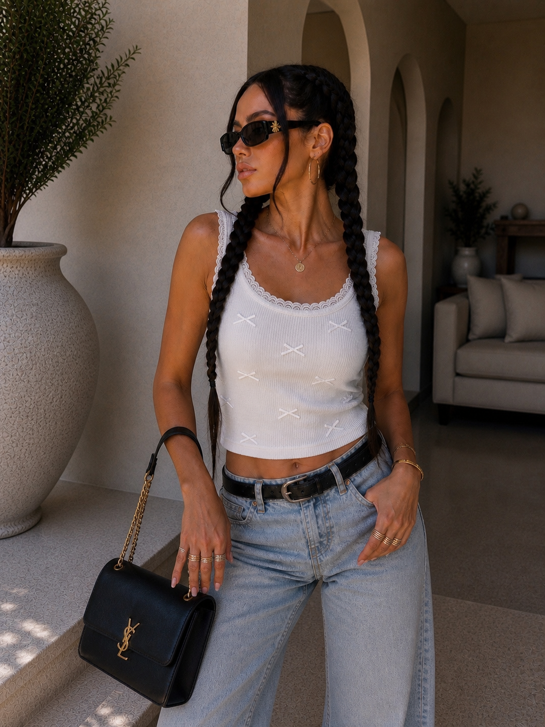 Top a costine con fiocchetti - R.a. Boutique