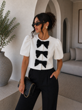 Giacca crop con fiocchi bianco nero - R.a. Boutique
